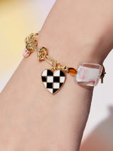 wearing Custom Lucky Charm Initial Bracelet